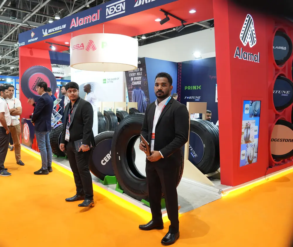 Al Amal team at the Automechanika Dubai 2024 stand