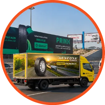 Branded delivery truck and billboard