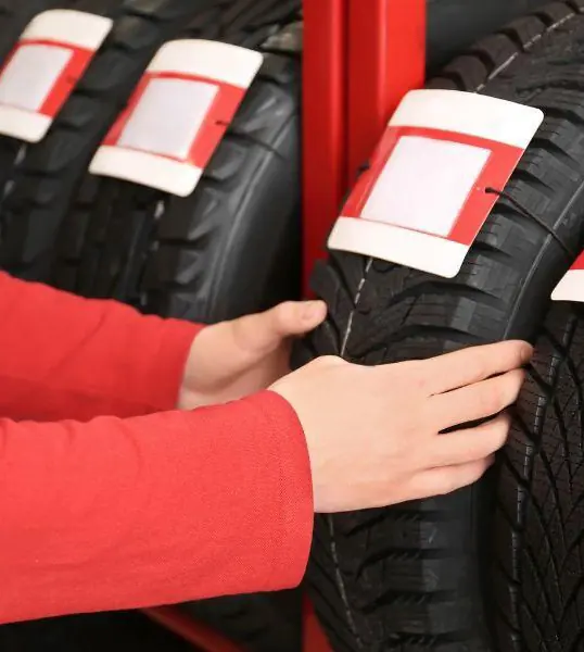 Customer choosing tyres