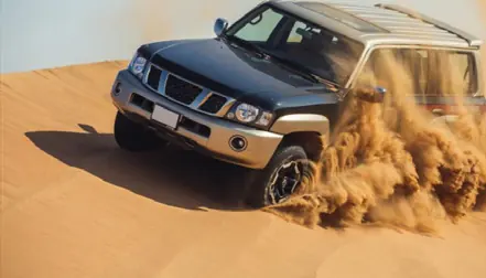 4x4 driving on sand